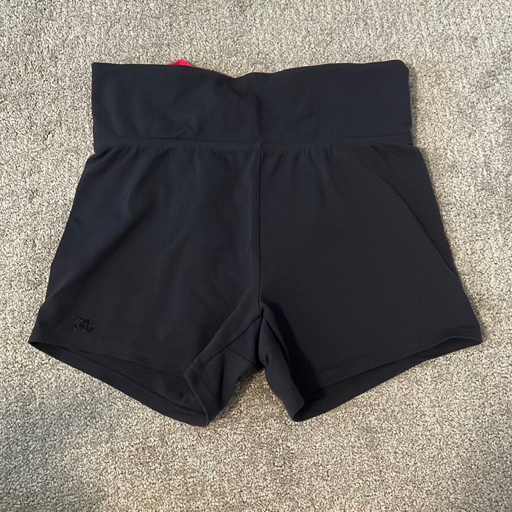 Grey and pink spandex shorts.